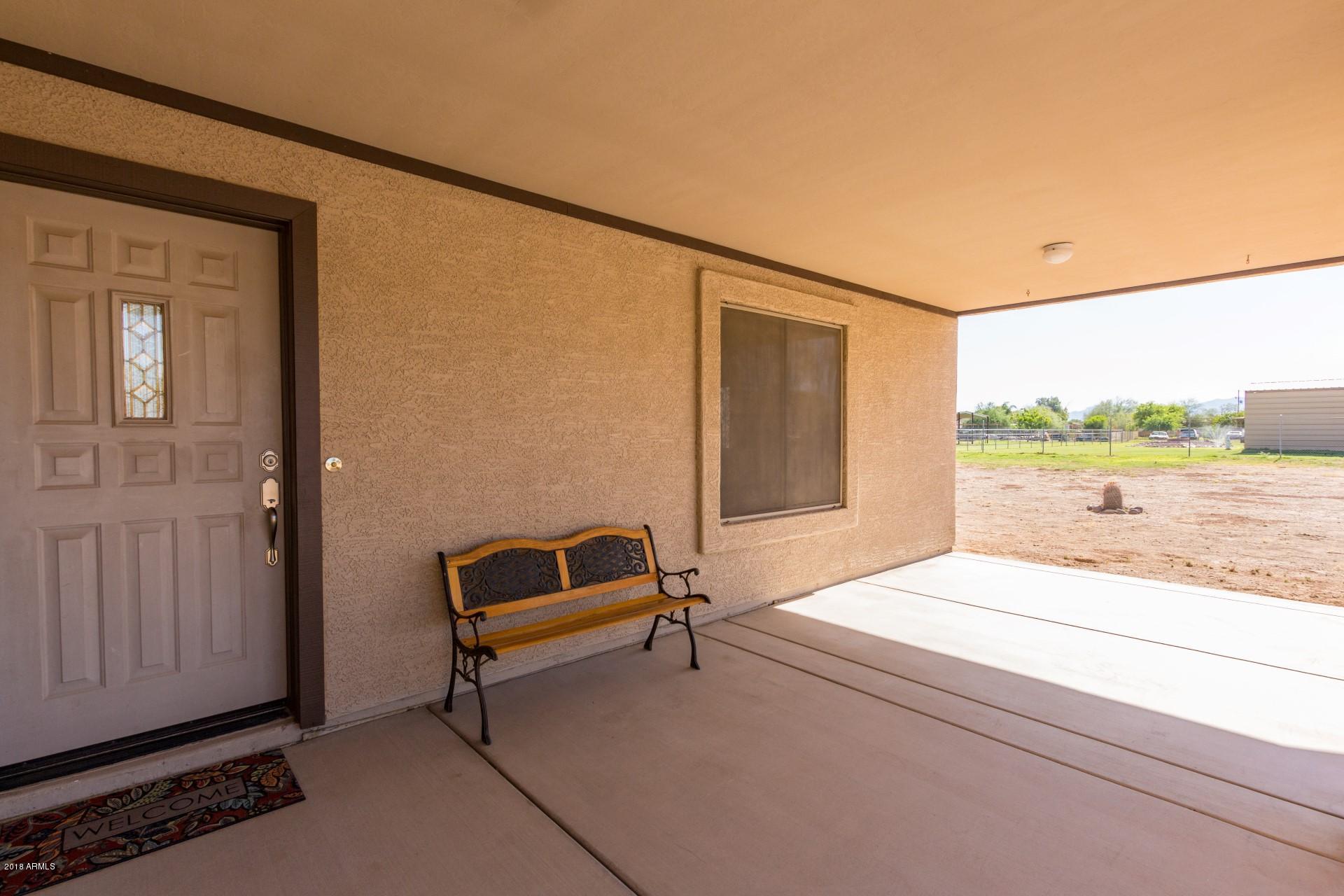 12545 West Varney Road El Mirage, AZ 85335 - Photo 3 of 25 front porch