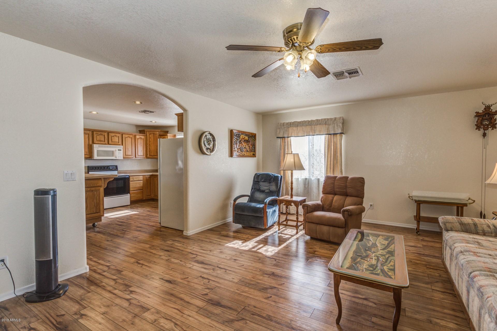 12545 West Varney Road El Mirage, AZ 85335 - Photo 4 of 25 Spacious living room