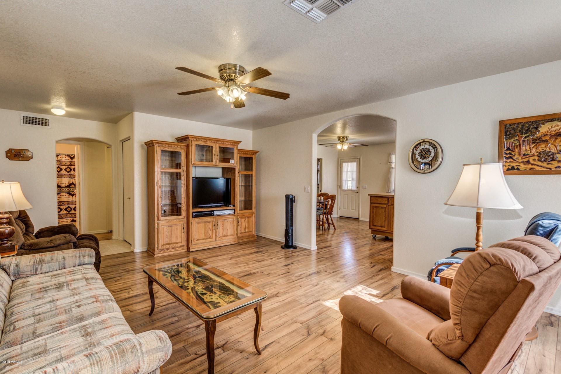 12545 West Varney Road El Mirage, AZ 85335 - Photo 5 of 25 Open living room