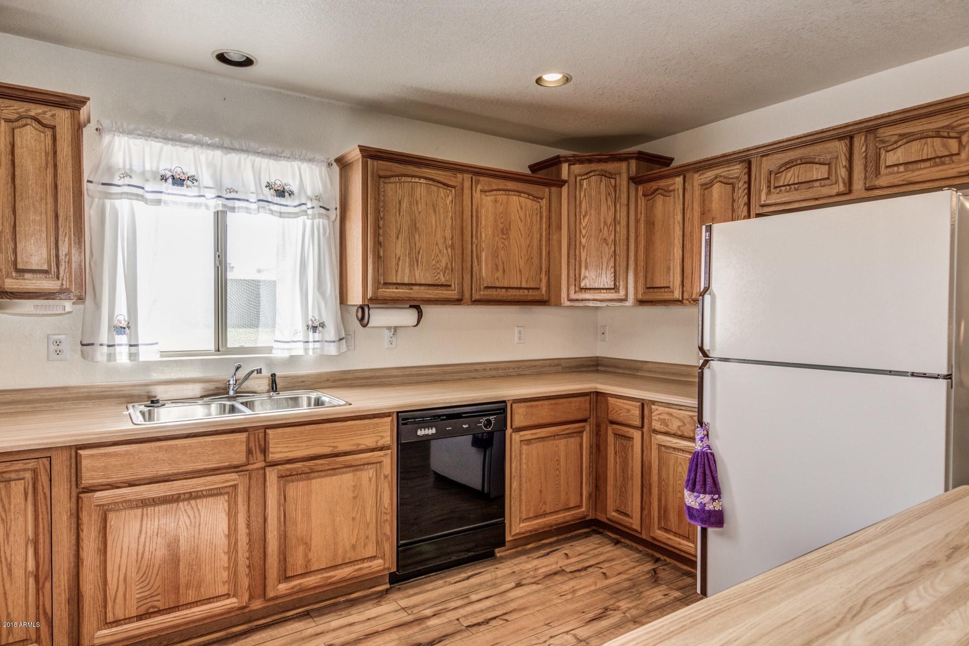 12545 West Varney Road El Mirage, AZ 85335 - Photo 9 of 25 kitchen