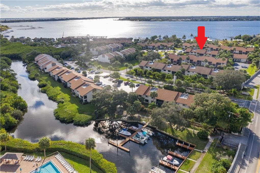 a view of a city with a lake