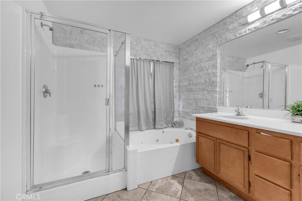 48734 Chichen Itza Road Coachella, CA 92236 - Photo 10 of 18 a bathroom with a tub sink shower and mirror