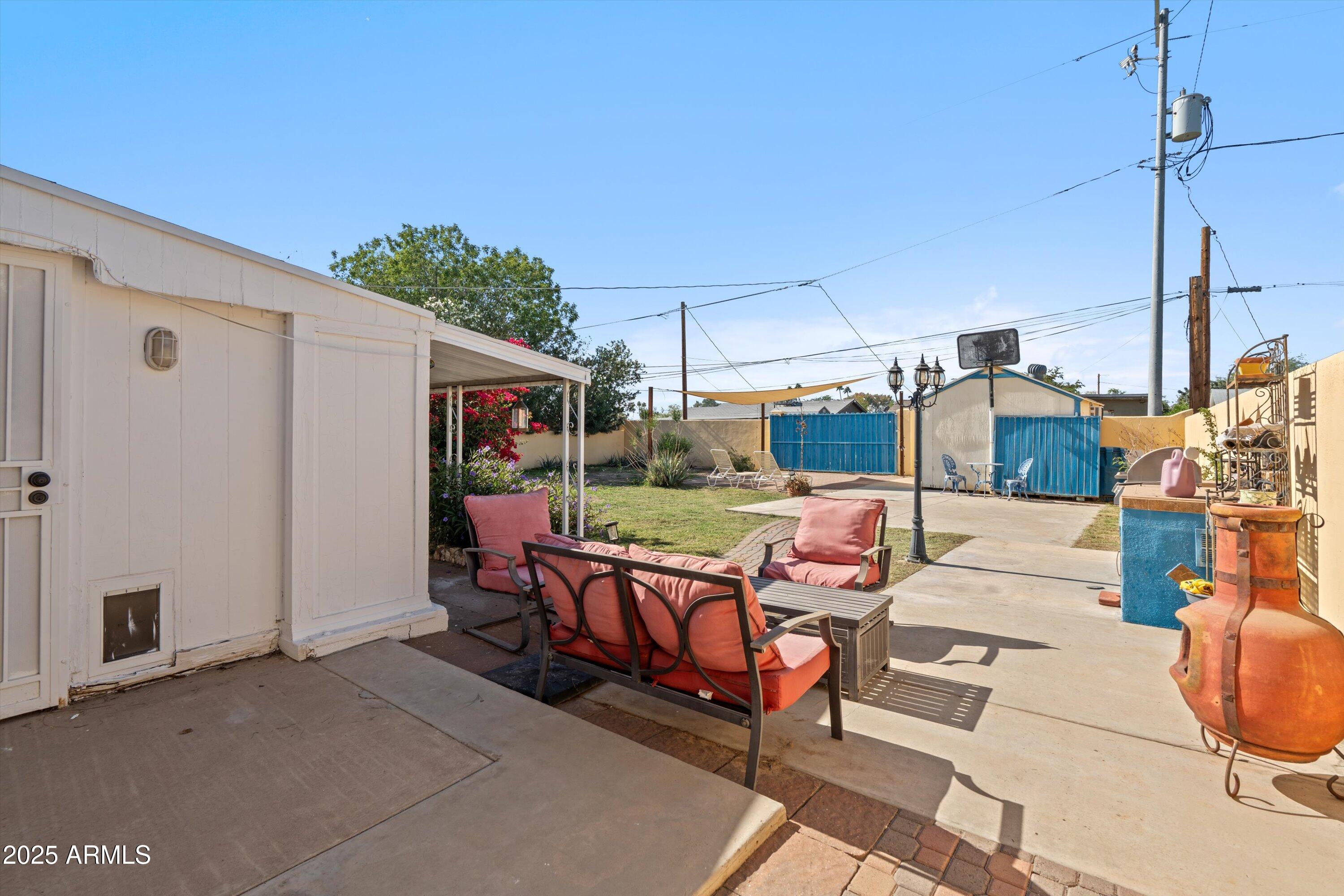 8216 North 9th Street Phoenix, AZ 85020 - Photo 24 of 39 a view of a terrace with furniture and a backyard