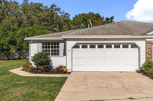 a house view with a garden space
