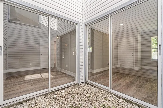 wooden floor in an empty room and window