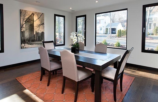 4 Botsford Road Newton, MA 02467 - Photo 5 of 10 a dining room with furniture a rug a potted plant and wooden floor