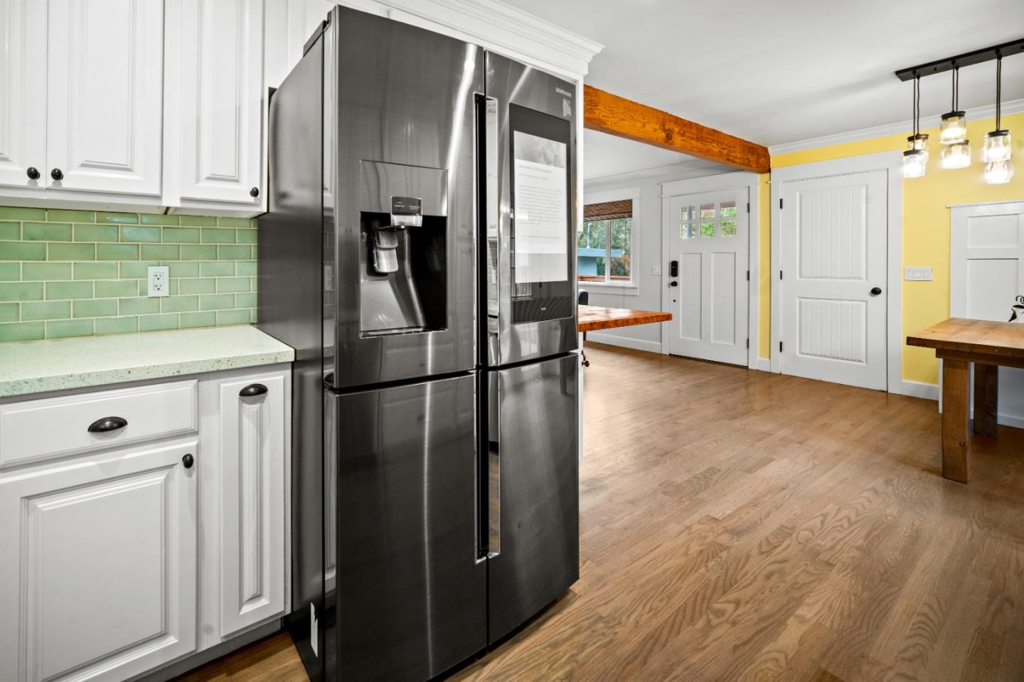 1321 David Avenue Pacific Grove, CA 93950 - Photo 11 of 24 a kitchen with stainless steel appliances a refrigerator and a sink