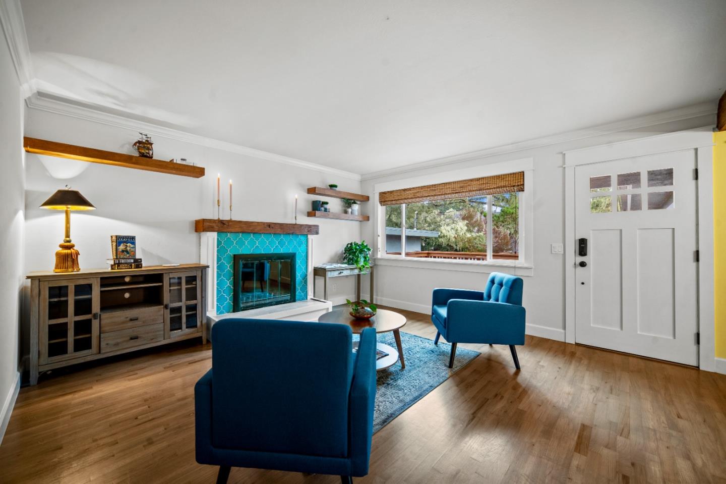 1321 David Avenue Pacific Grove, CA 93950 - Photo 3 of 24 a living room with furniture flat screen tv and wooden floor