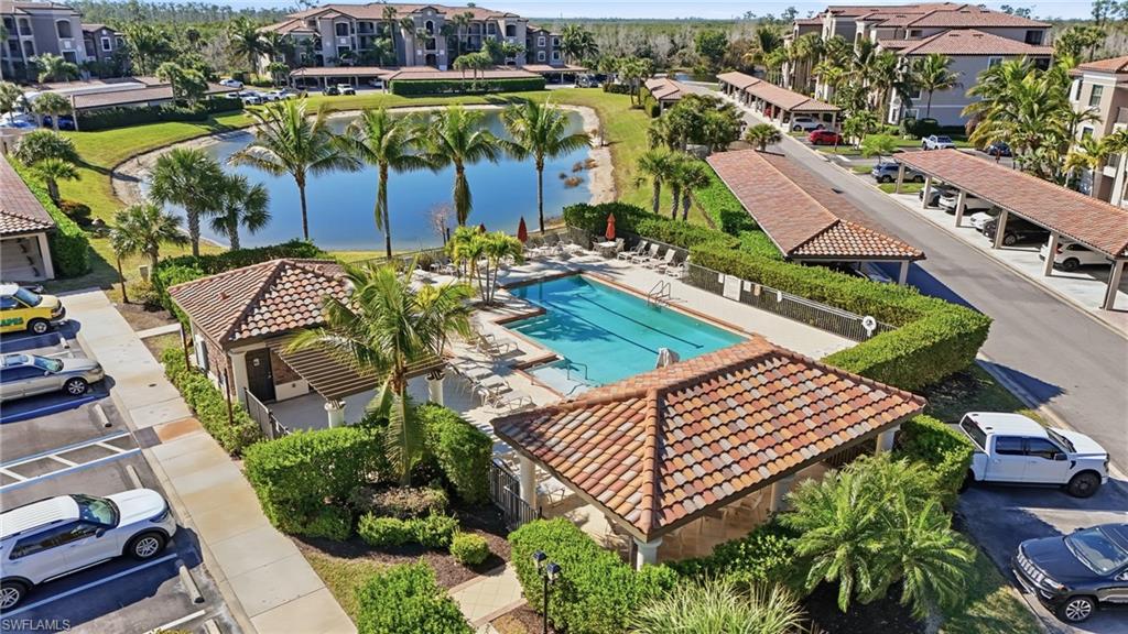9830 Giaveno Circle, Unit 1646 Naples, FL 34113 - Photo 25 of 30 an aerial view of a house with garden space and patio