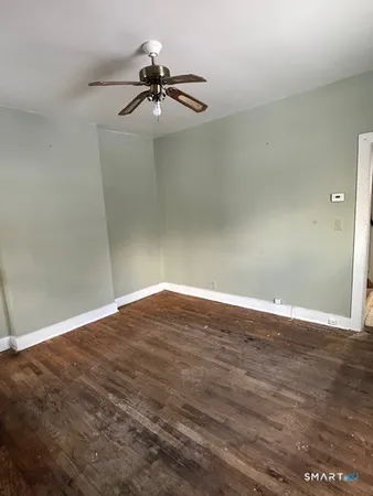 a view of a big room with wooden floor