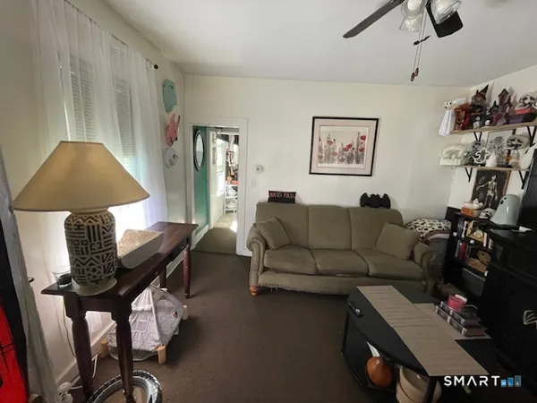 a living room with furniture and a window