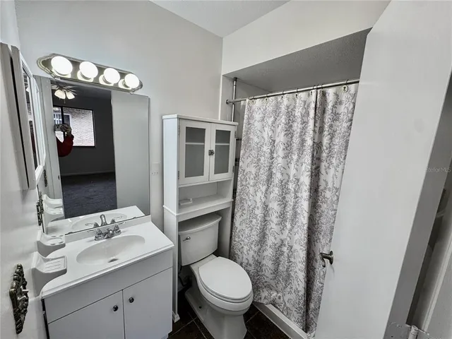 a view of a wooden door and a window