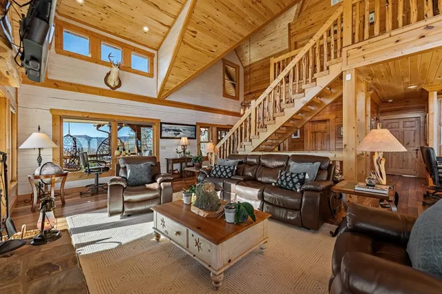 a kitchen with stainless steel appliances a stove a refrigerator and a cabinets