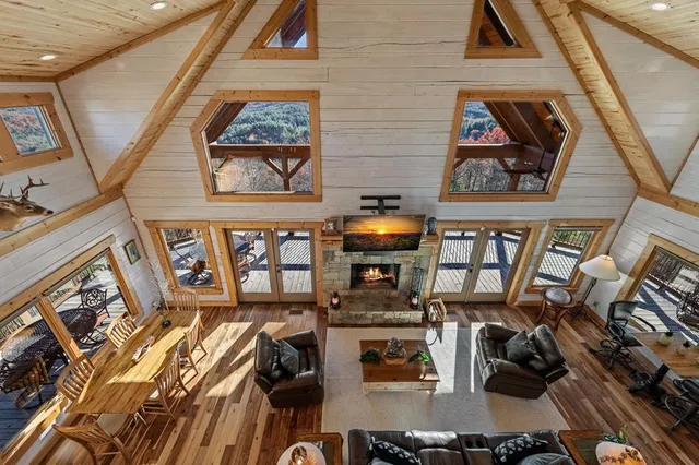 a view of a balcony with wooden floor
