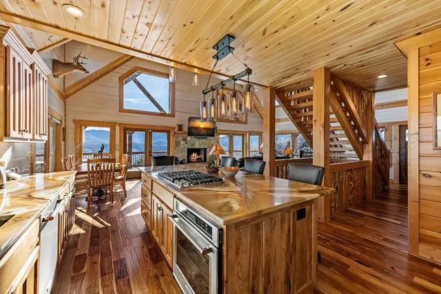 a bed room with a bed and a chandelier