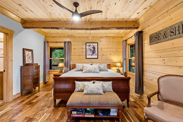 a living room with furniture fireplace and a flat screen tv