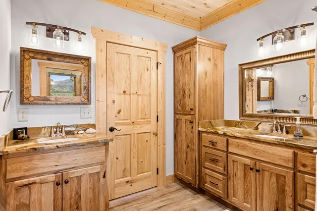 a bed room with a bed and a window