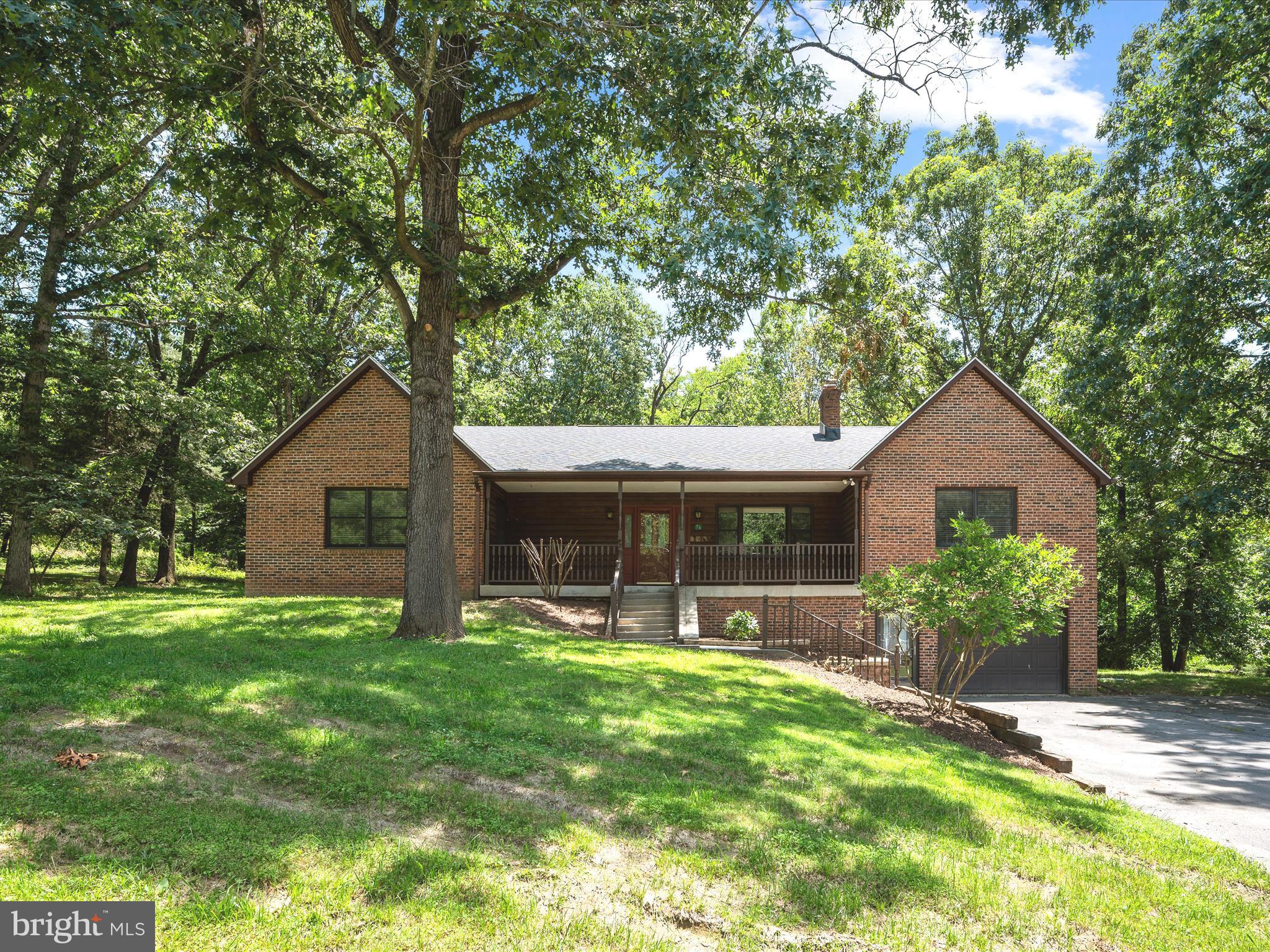 76 Sycamore Road Harpers Ferry, WV 25425 - Photo 1 of 63 Brick & cedar raised ranch on 1.39 lush acres!