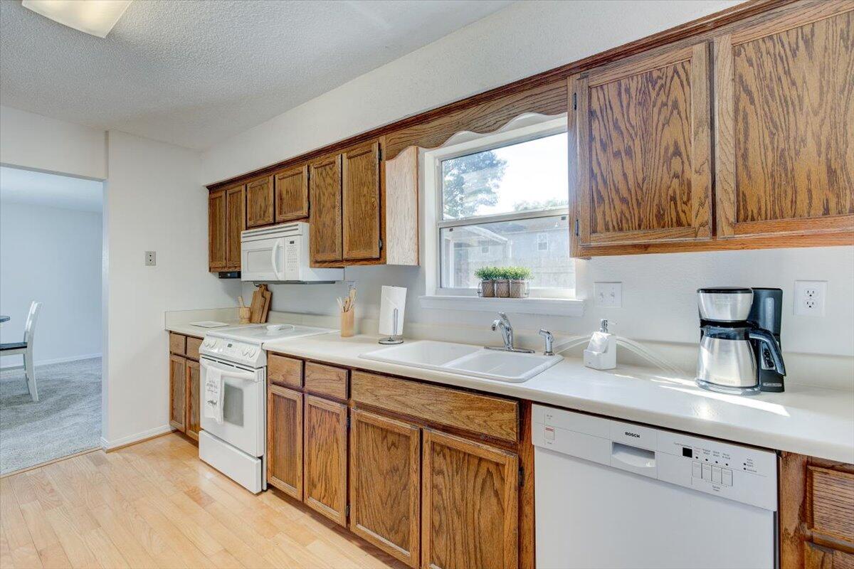 803 Valley Road Crestview, FL 32539 - Photo 15 of 22 a kitchen with a sink cabinets and window