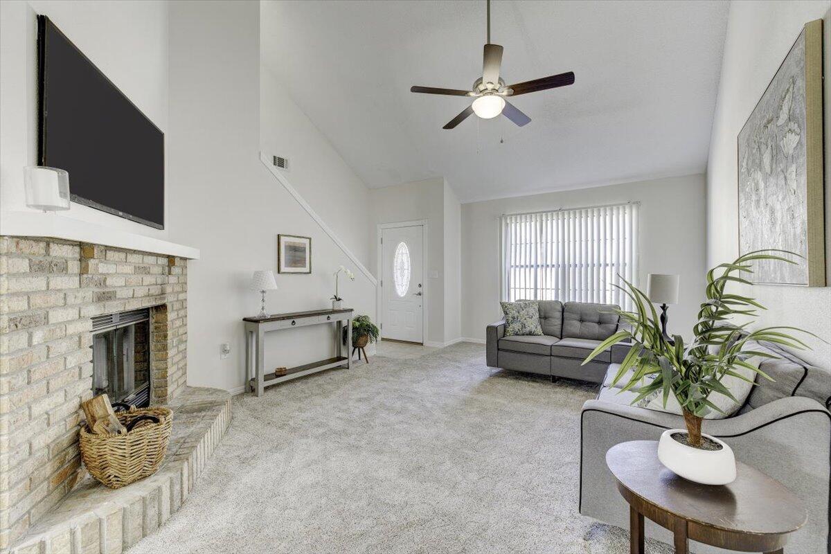 803 Valley Road Crestview, FL 32539 - Photo 6 of 22 a living room with furniture and a fireplace