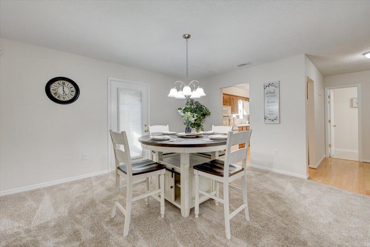 803 Valley Road Crestview, FL 32539 - Photo 8 of 22 a dining room with furniture and window