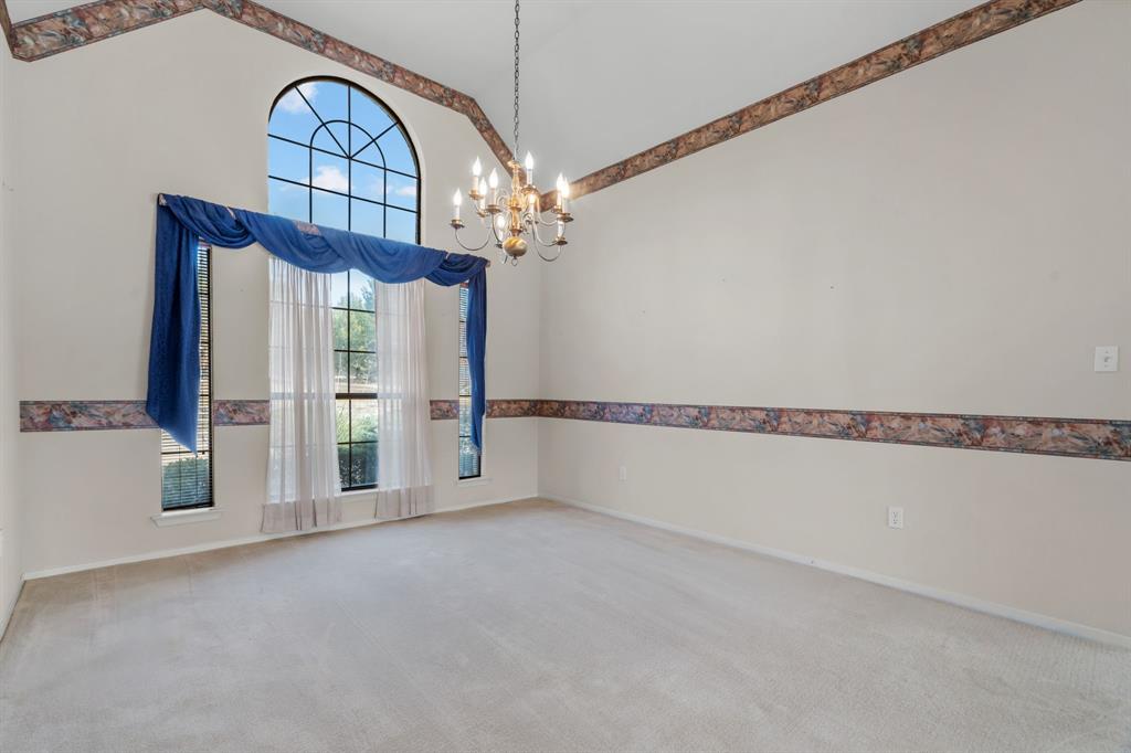 1317 Timber Ridge Road Weatherford, TX 76088 - Photo 13 of 40 a view of an empty room with a window