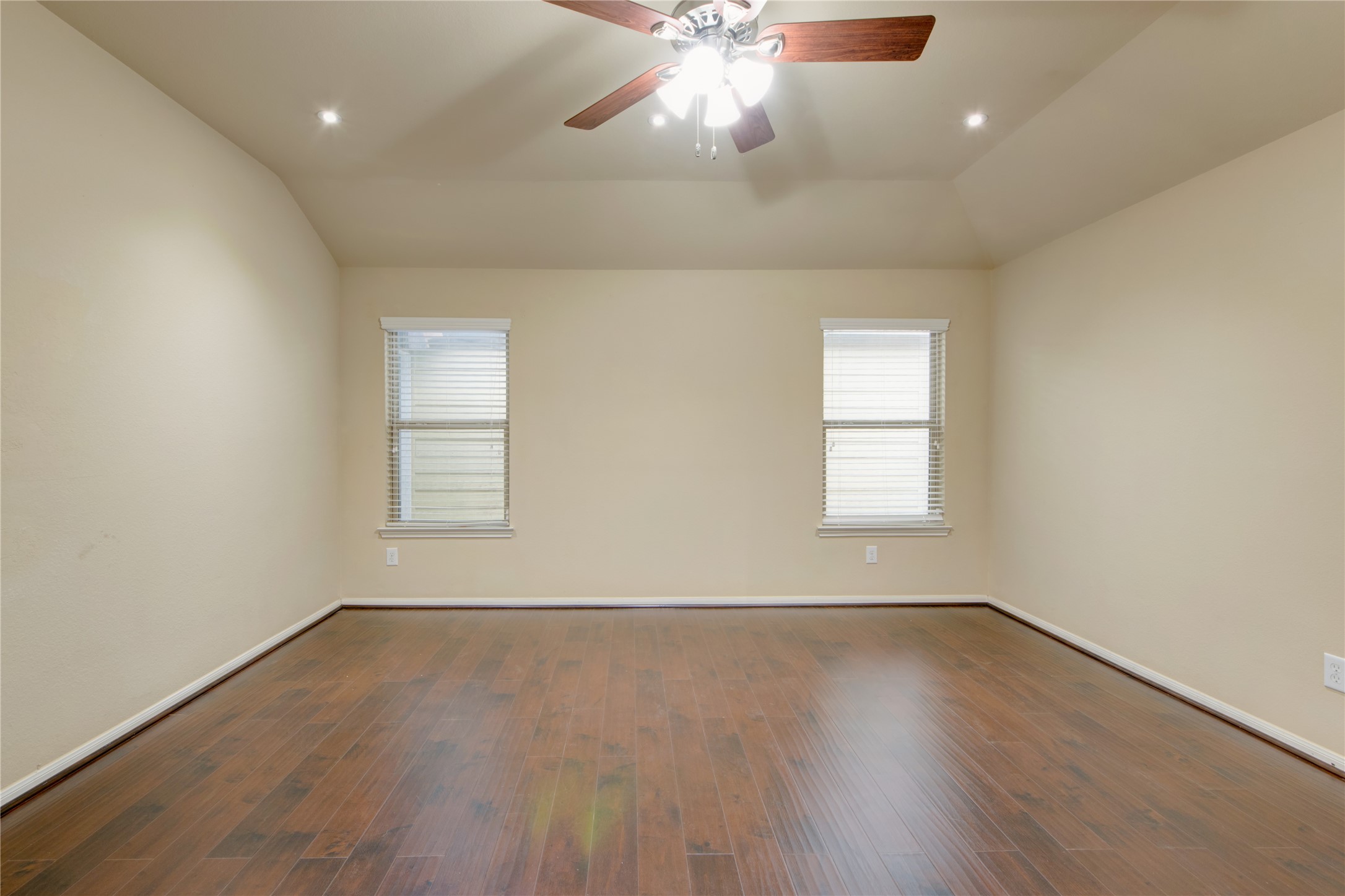 9322 Limestone Ranch Lane Richmond, TX 77407 - Photo 20 of 40 wooden floor in an empty room with a window