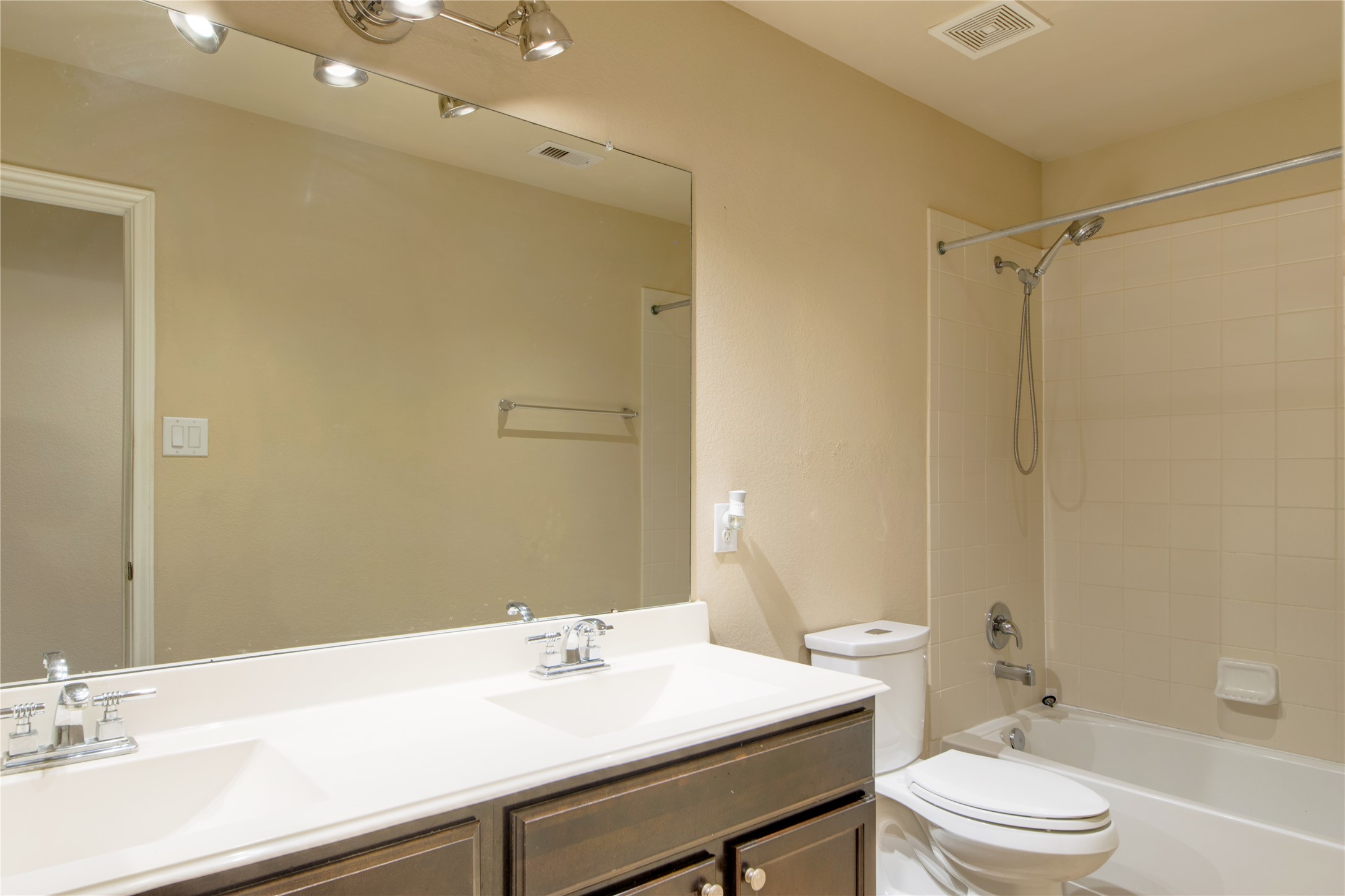 9322 Limestone Ranch Lane Richmond, TX 77407 - Photo 29 of 40 a bathroom with a sink a toilet and shower