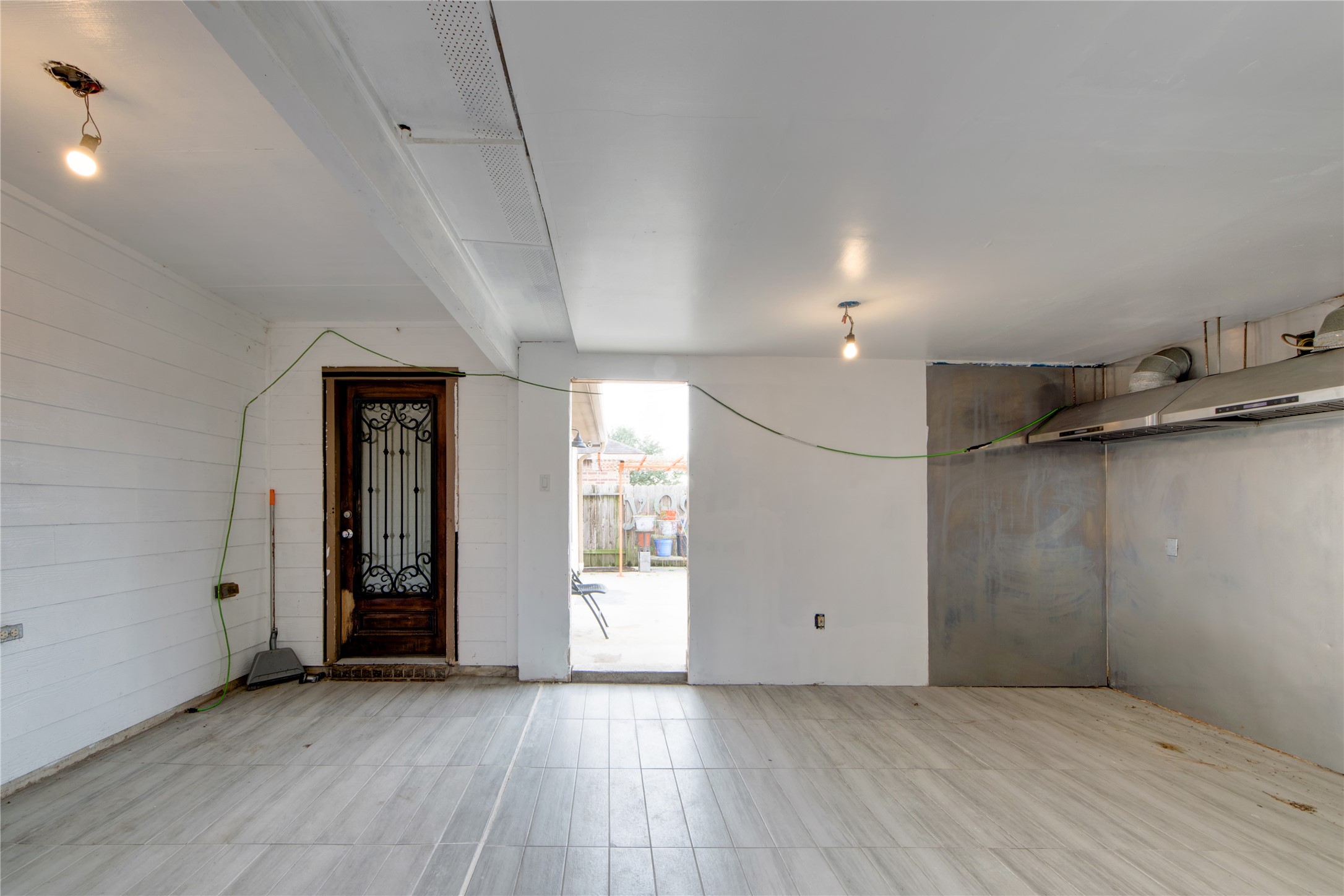 9322 Limestone Ranch Lane Richmond, TX 77407 - Photo 30 of 40 an empty room with wooden floor and windows