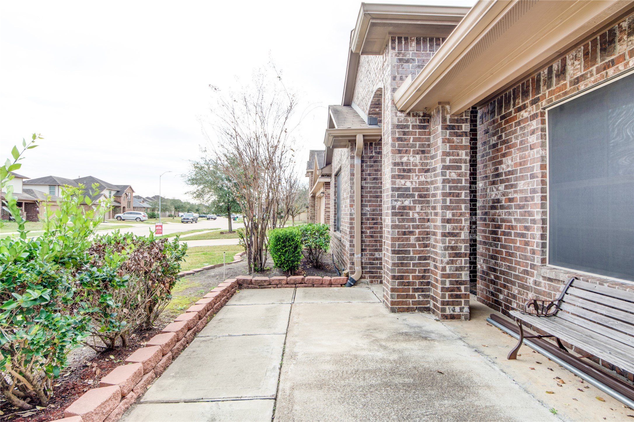 9322 Limestone Ranch Lane Richmond, TX 77407 - Photo 3 of 40 a view of a pathway with a house