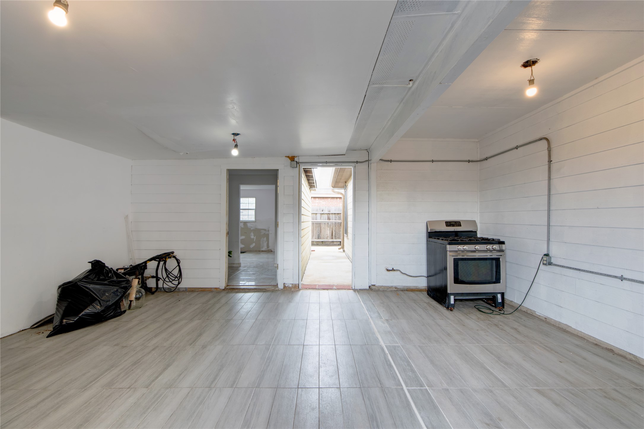 9322 Limestone Ranch Lane Richmond, TX 77407 - Photo 31 of 40 a living room with furniture and a wooden floor
