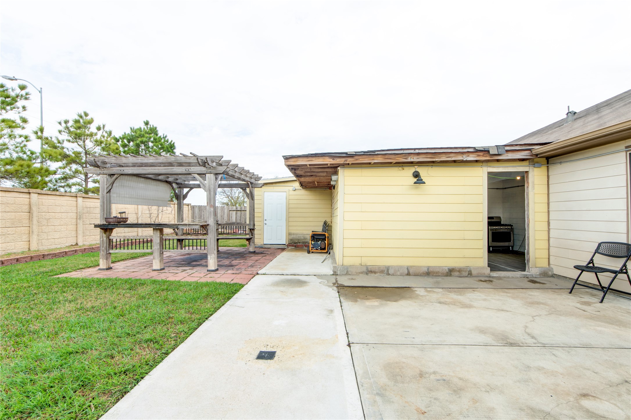 9322 Limestone Ranch Lane Richmond, TX 77407 - Photo 33 of 40 a view of a house with a yard and sitting area