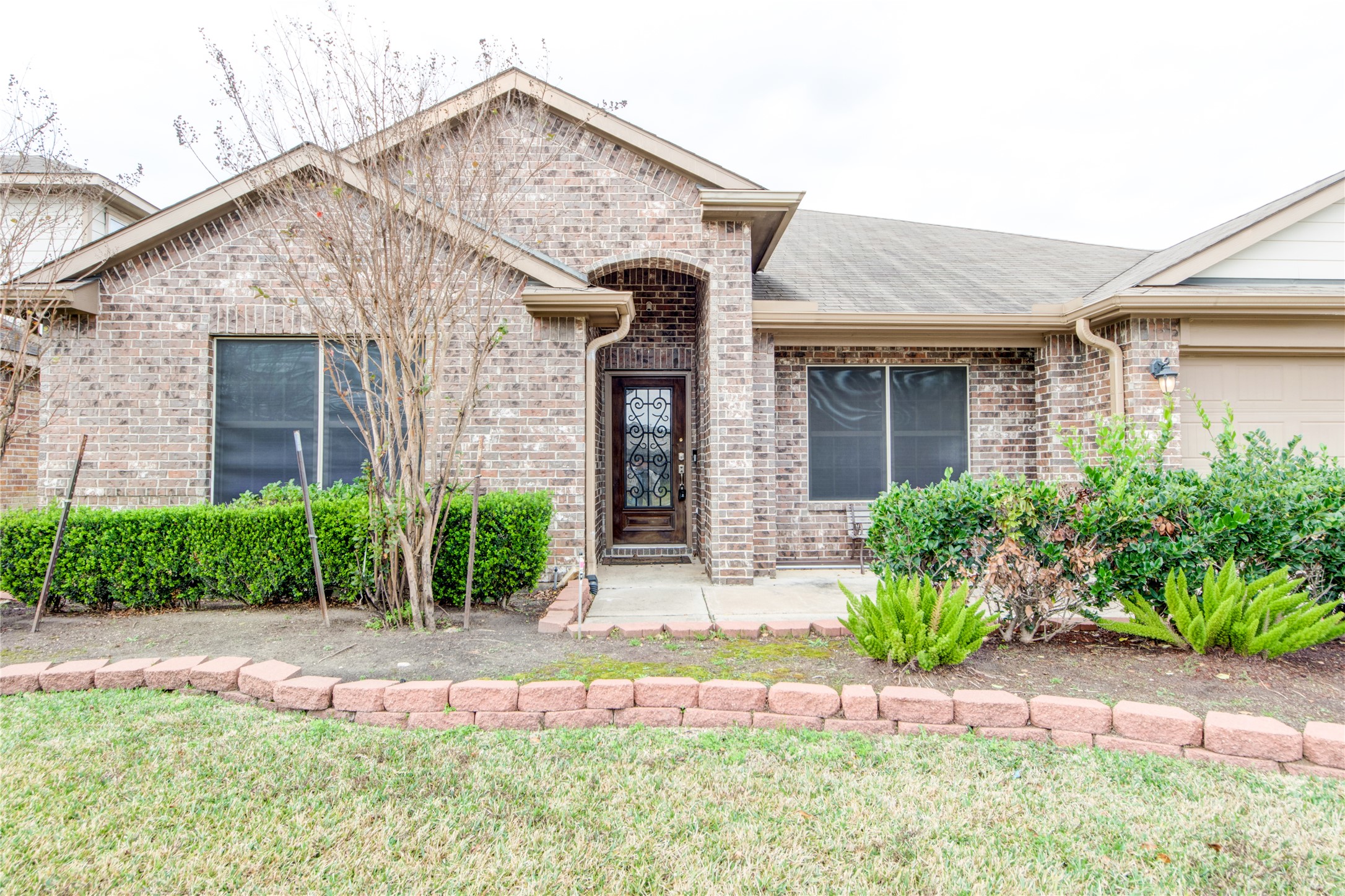 9322 Limestone Ranch Lane Richmond, TX 77407 - Photo 39 of 40 a front view of a house with garden