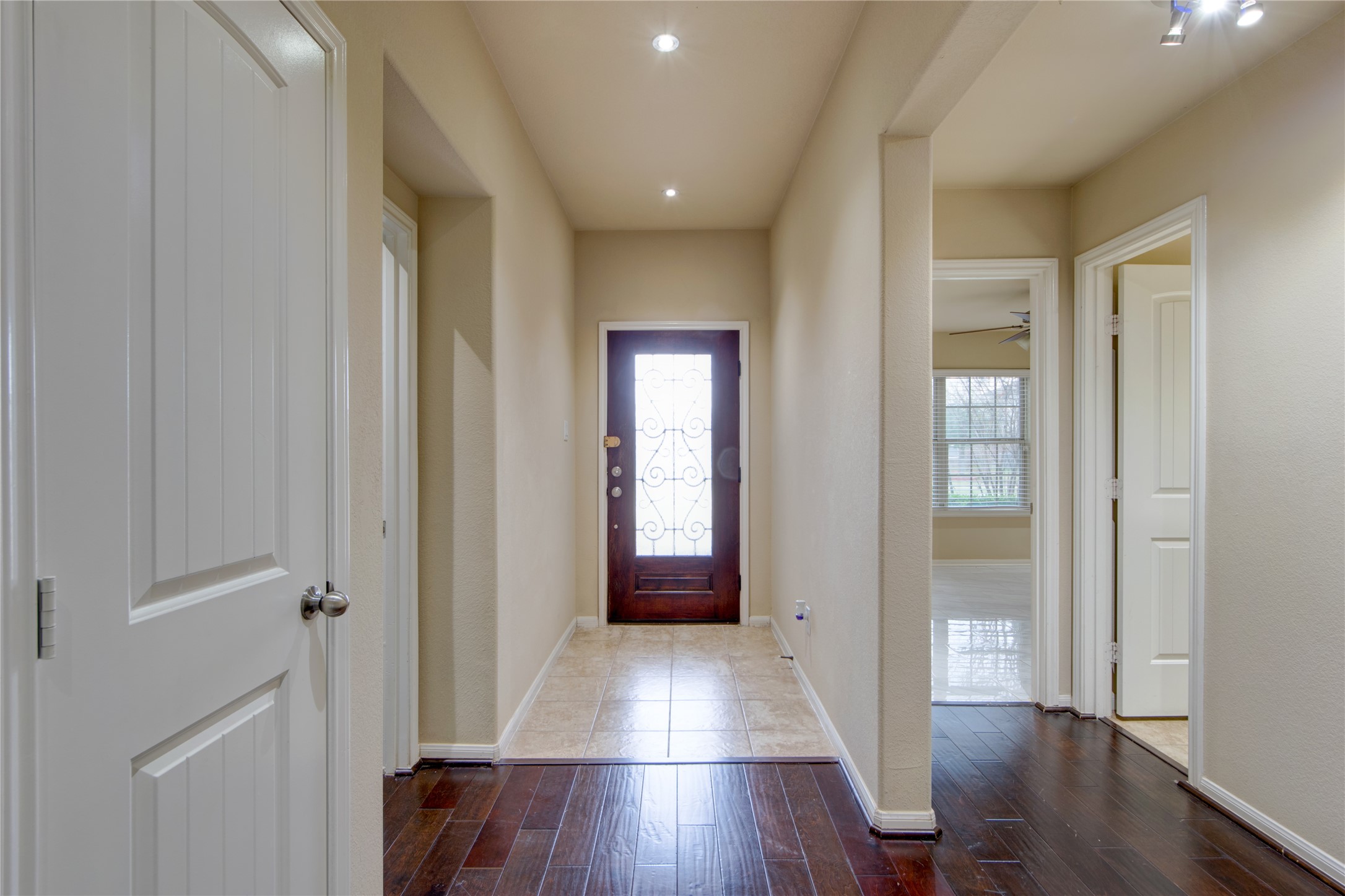 9322 Limestone Ranch Lane Richmond, TX 77407 - Photo 5 of 40 a view of gallery with wooden floor