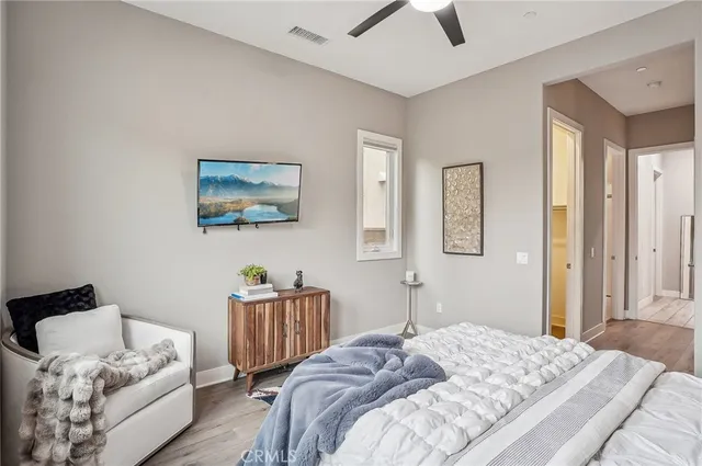 a bedroom with a bed and closet