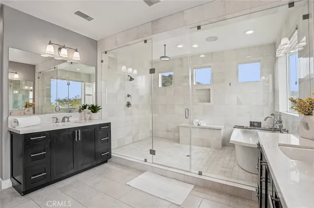 a outdoor living space with furniture potted plant and a fireplace