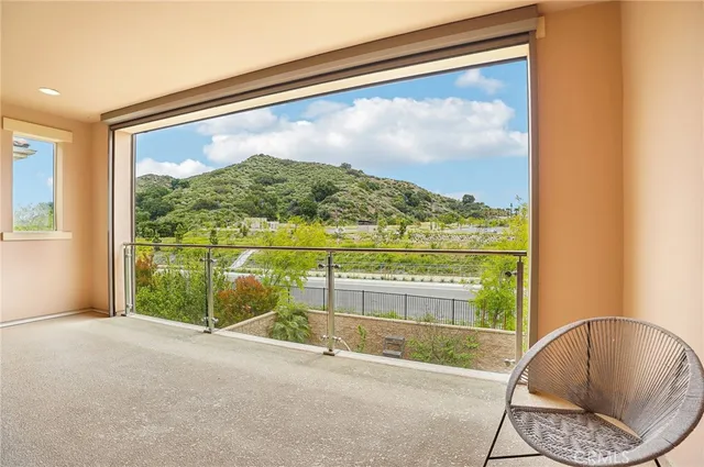a swimming pool with outdoor seating