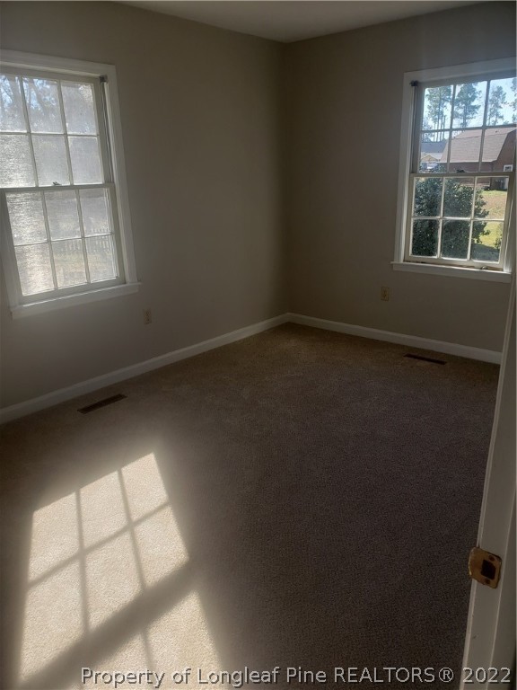 315 Old Farm Road Raeford, NC 28376 - Photo 6 of 13 an empty room with a window