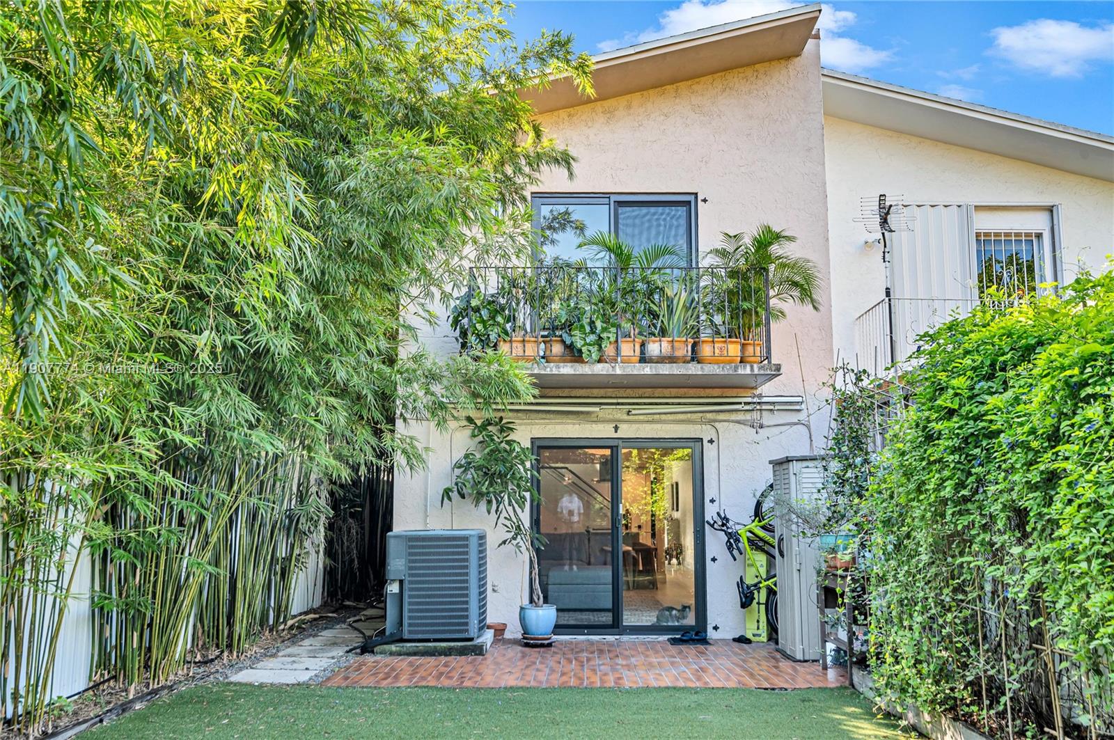 2965 Southwest 25th Terrace, Unit 2965 Miami, FL 33133 - Photo 28 of 40 front view of a house with a yard