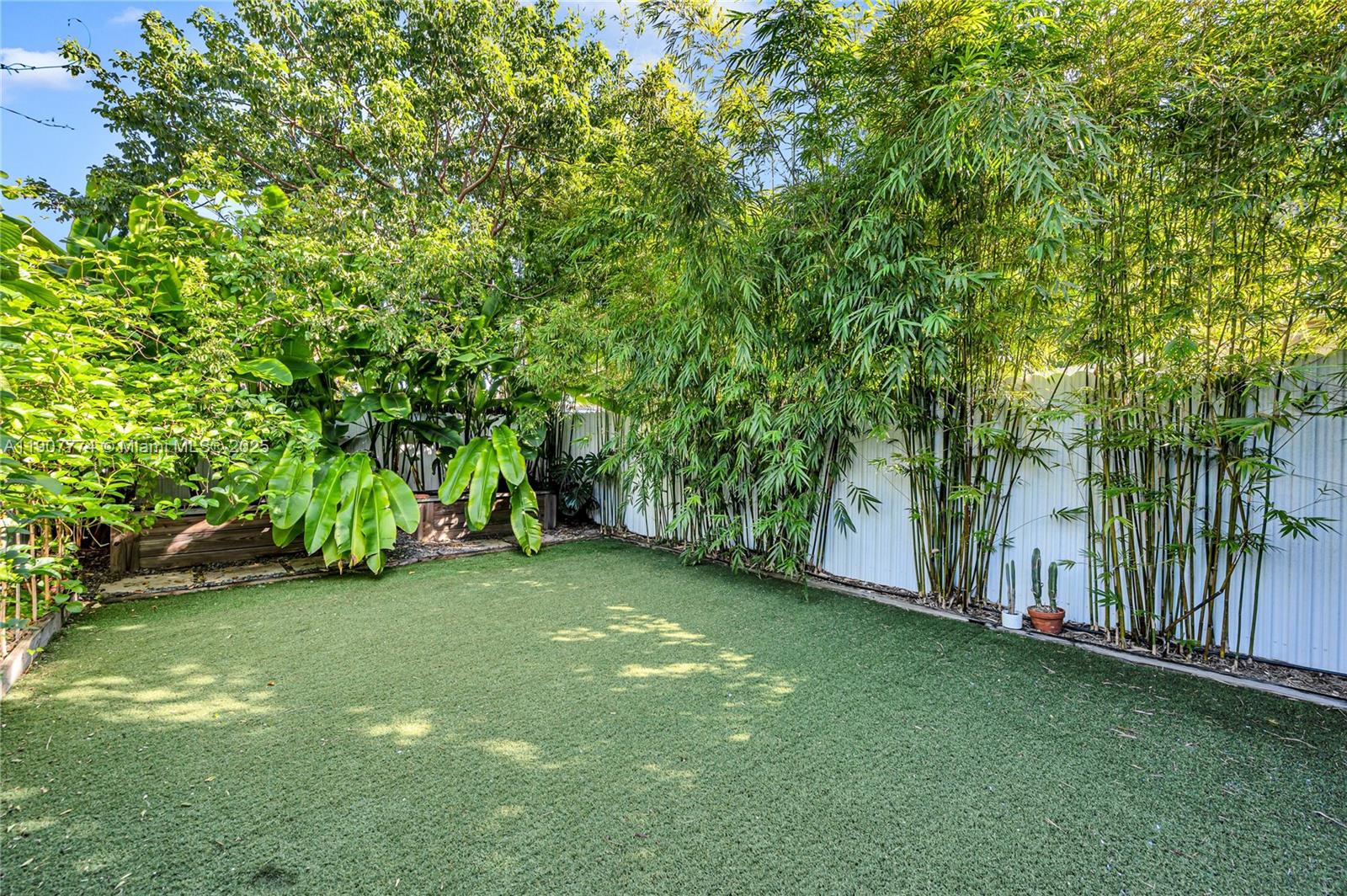 2965 Southwest 25th Terrace, Unit 2965 Miami, FL 33133 - Photo 29 of 40 a view of a lush green space