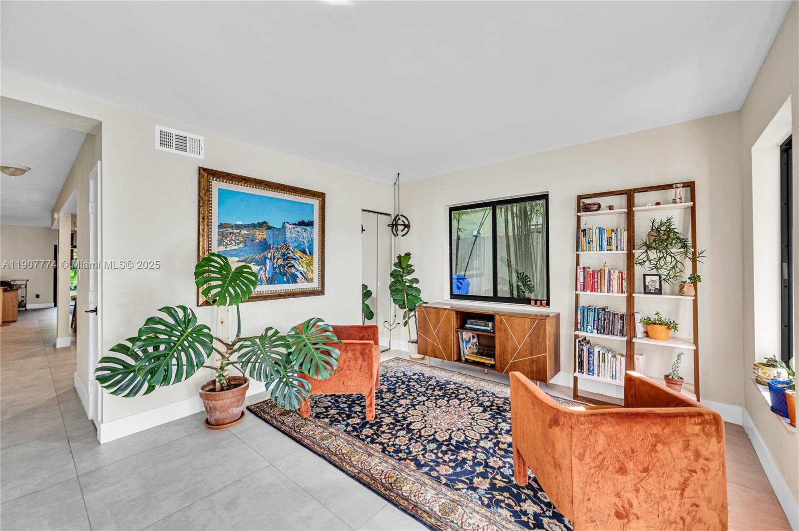 2965 Southwest 25th Terrace, Unit 2965 Miami, FL 33133 - Photo 3 of 40 a living room with furniture and a potted plant