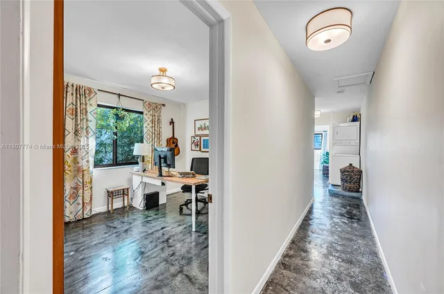 a view of a hallway view with living room