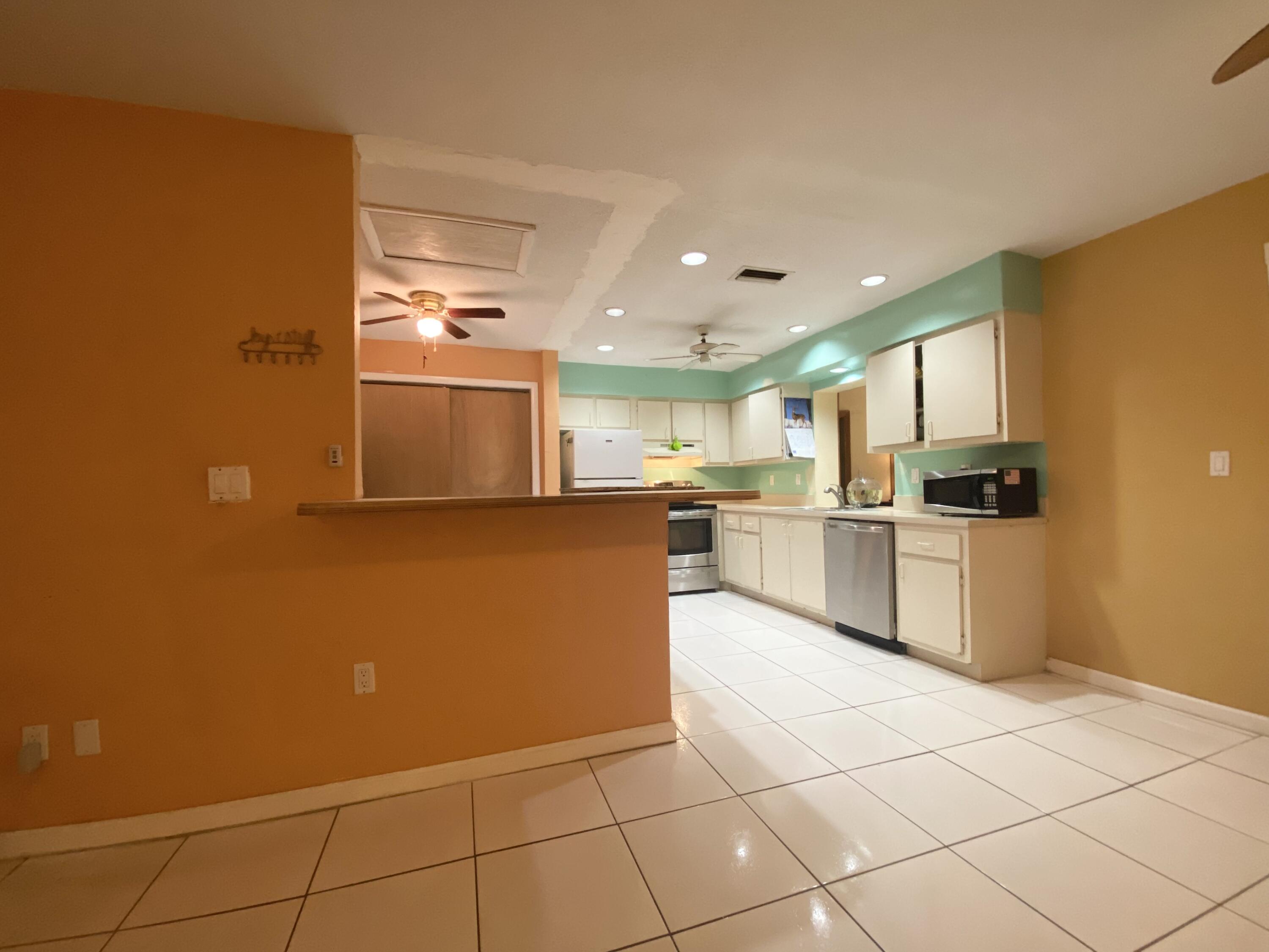 7401 Northwest 96th Avenue Tamarac, FL 33321 - Photo 10 of 20 7612AEB1-3F43-4ED2-932D-FDBE1034440F
