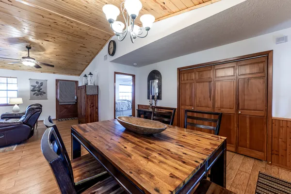 a dining room with furniture and window