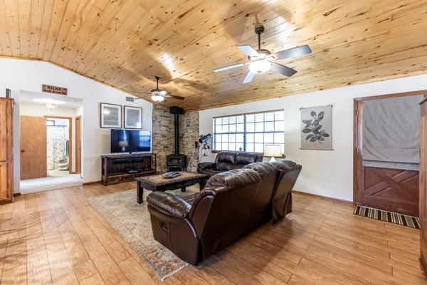 a living room with furniture and a window