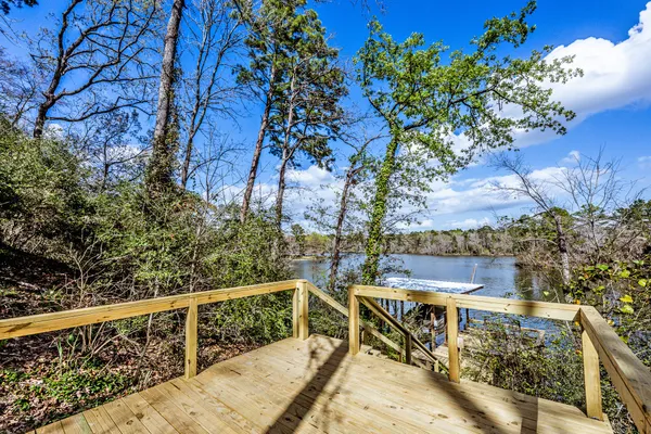 a view of balcony with furniture