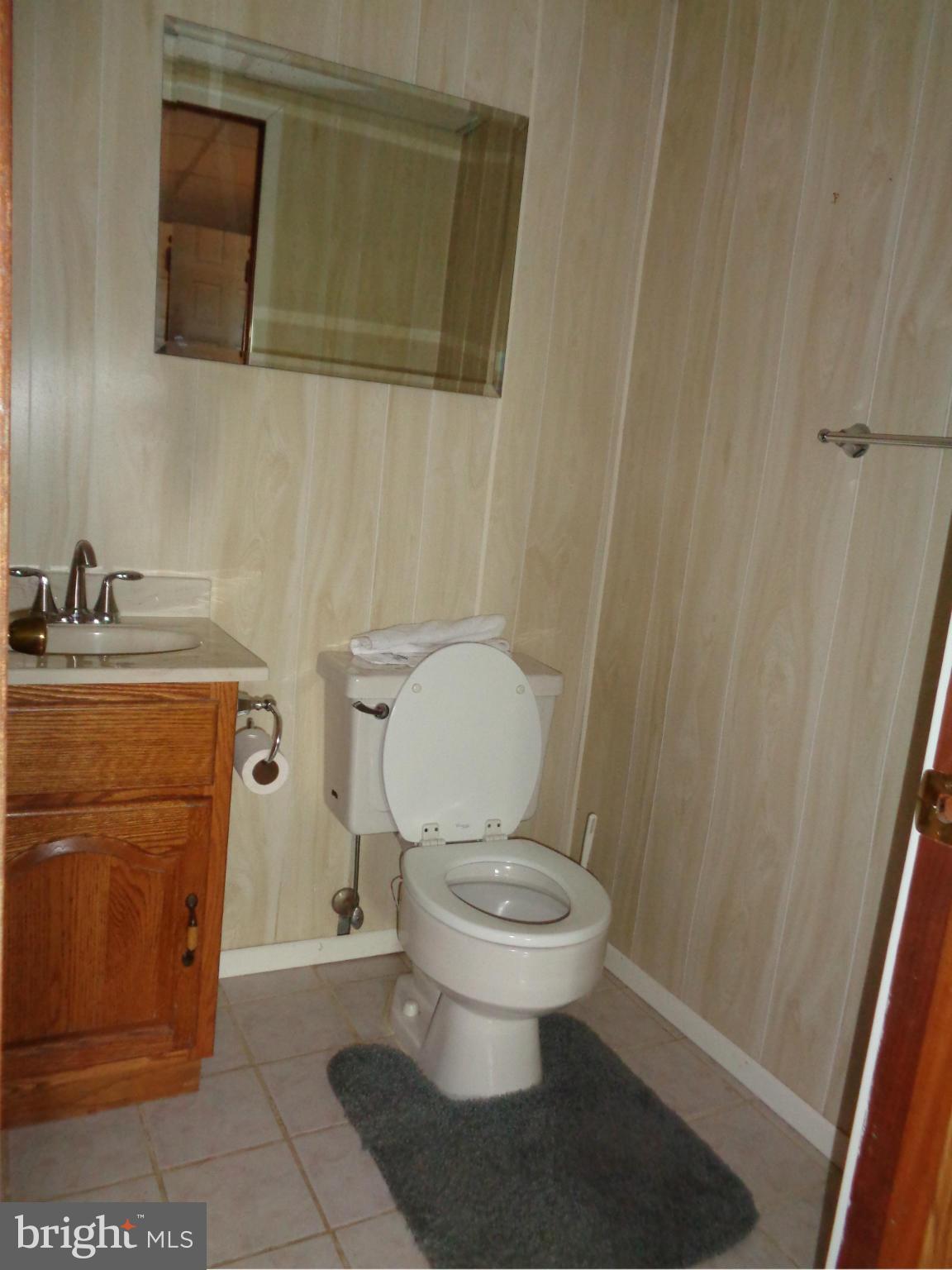 4307 York Road, Unit 1 Manchester, MD 21102 - Photo 15 of 30 a bathroom with a toilet and a sink