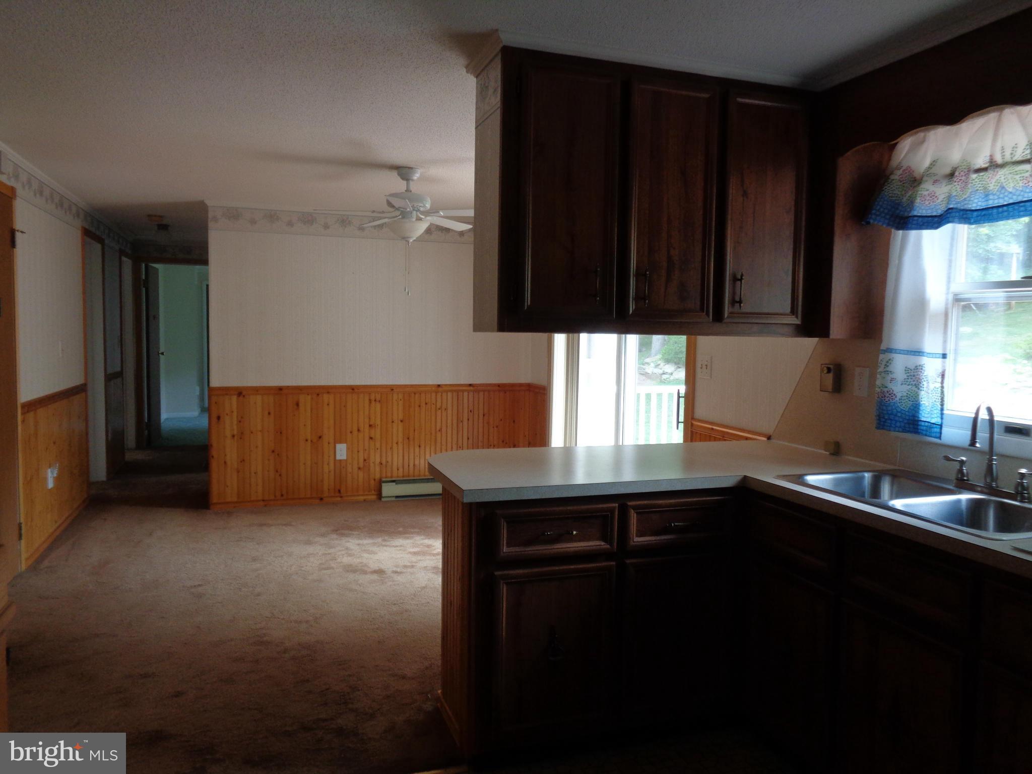 4307 York Road, Unit 1 Manchester, MD 21102 - Photo 20 of 30 a kitchen with a sink and cabinets