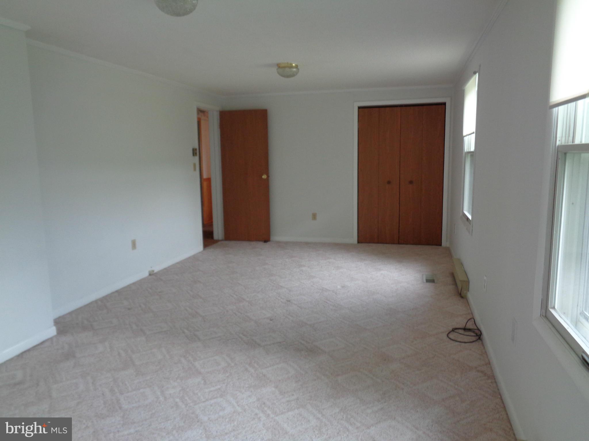 4307 York Road, Unit 1 Manchester, MD 21102 - Photo 30 of 30 an empty room with windows