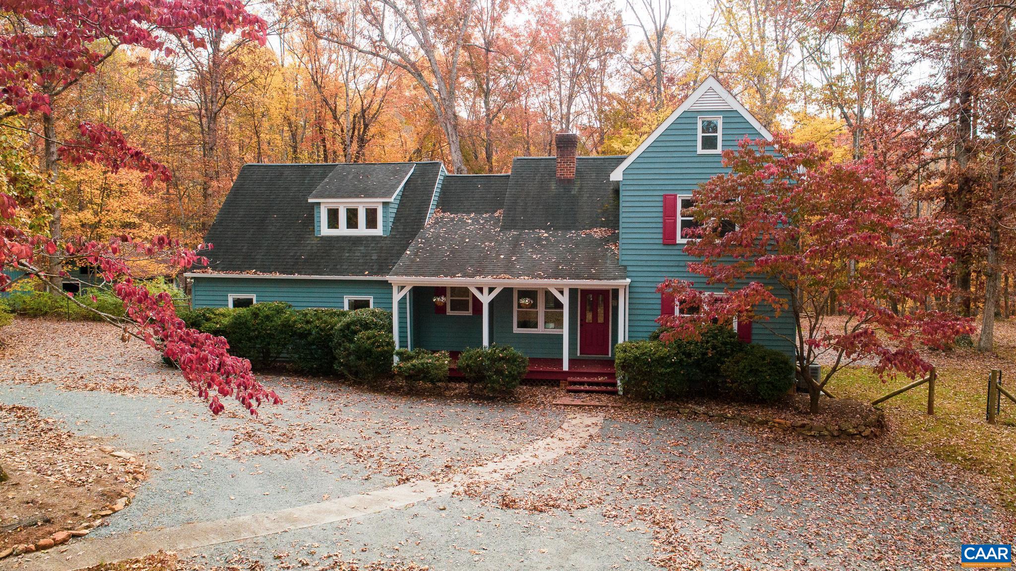 1900 Thunder Ridge Road Afton, VA 22920 - Photo 1 of 49 a front view of house with yard and trees around